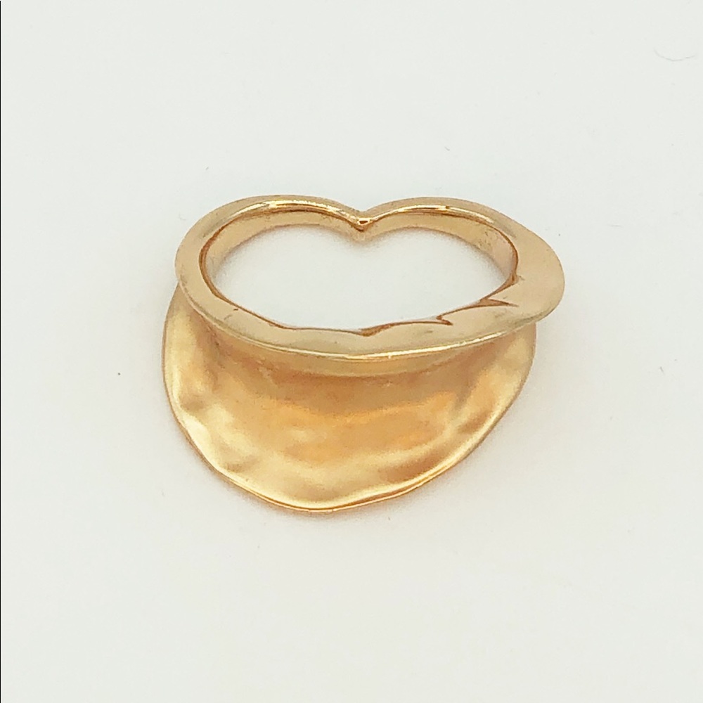 Women’s gold double cuff ring.